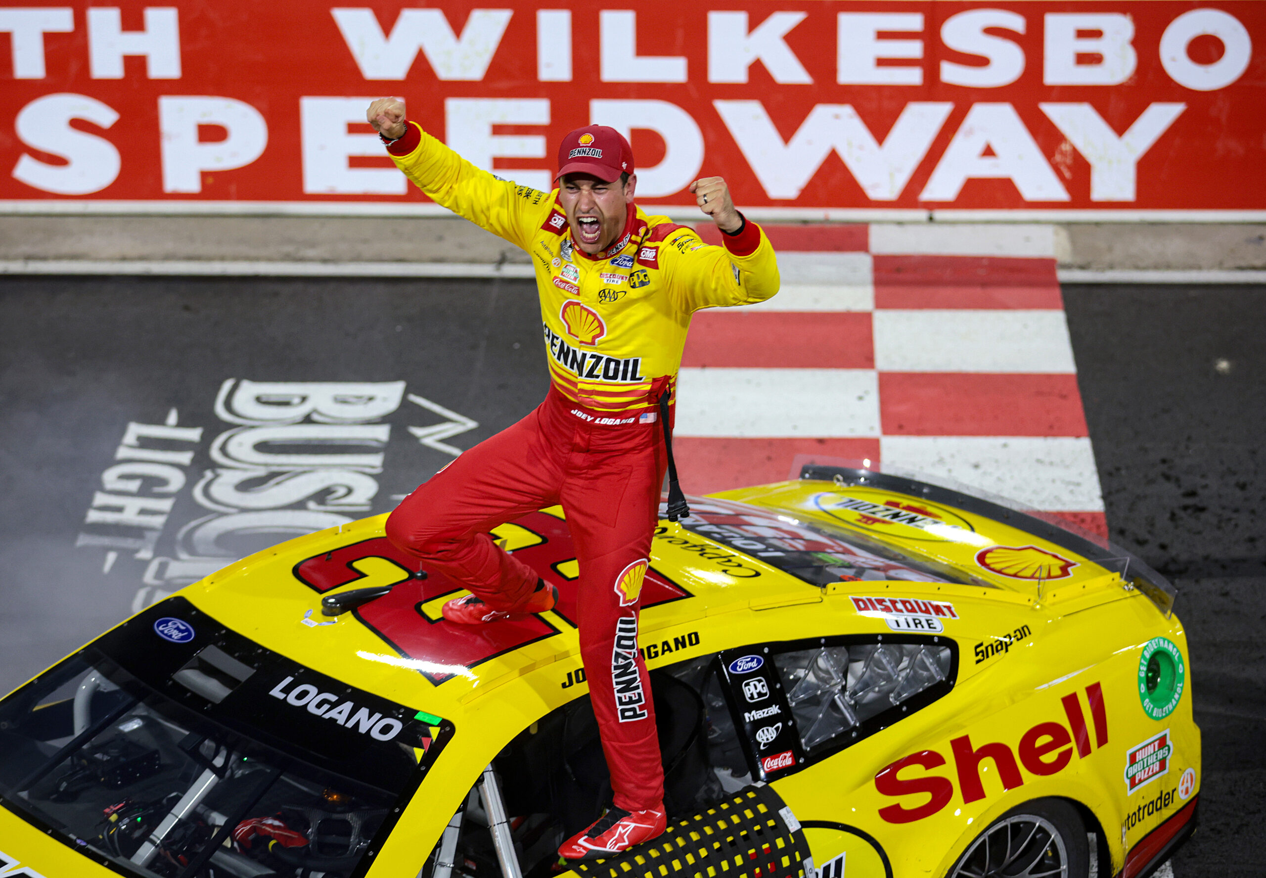 Logano Wins All-Star Race with Fireworks Behind Him