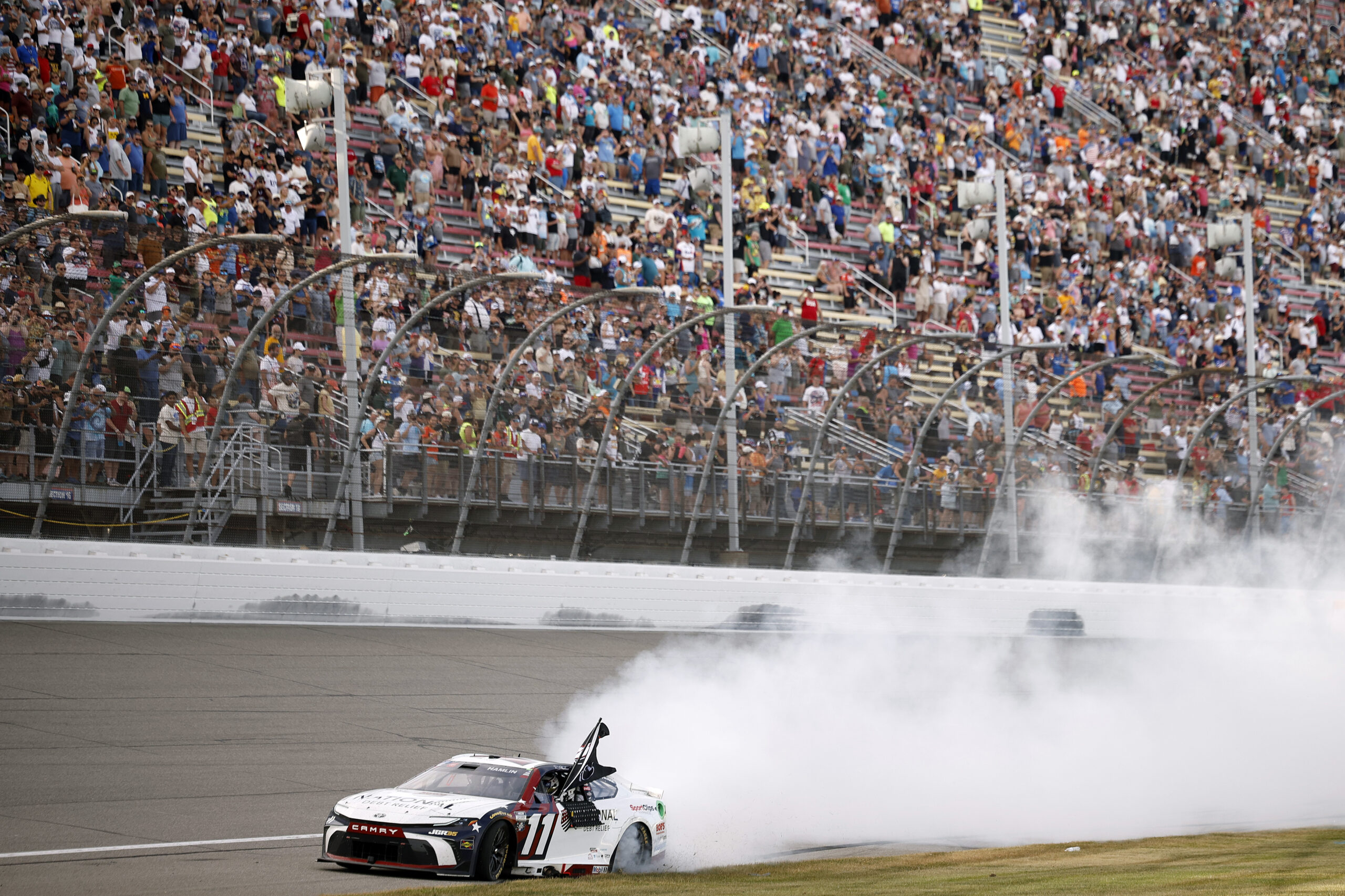 Denny Hamlin Drives Off into Michigan Sunset